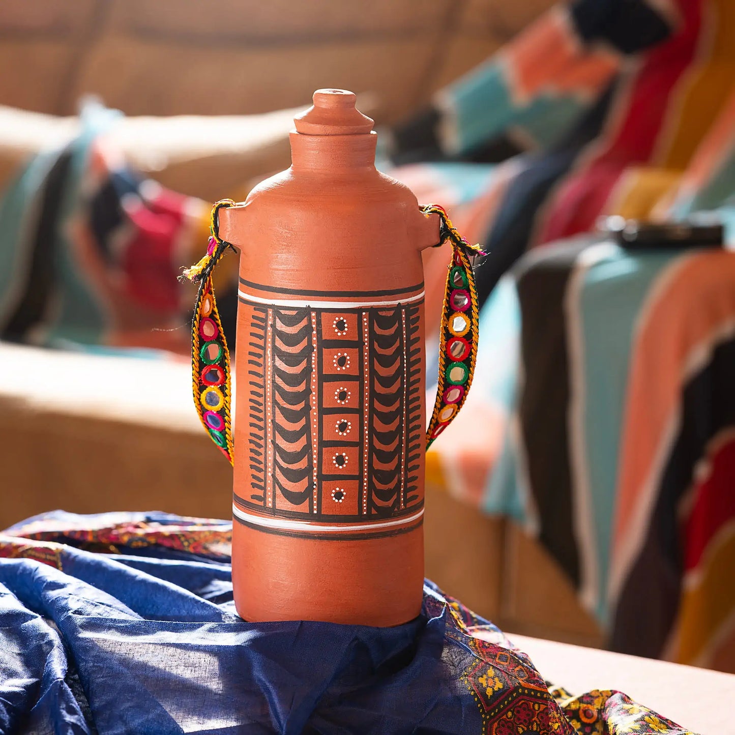 DhaaroVibes: Raahi – Hand-Painted Terracotta Water Bottle with Carry Strap (1L) | ARK Naturals