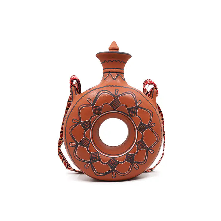 Rounded terracotta bottle with painted detailing