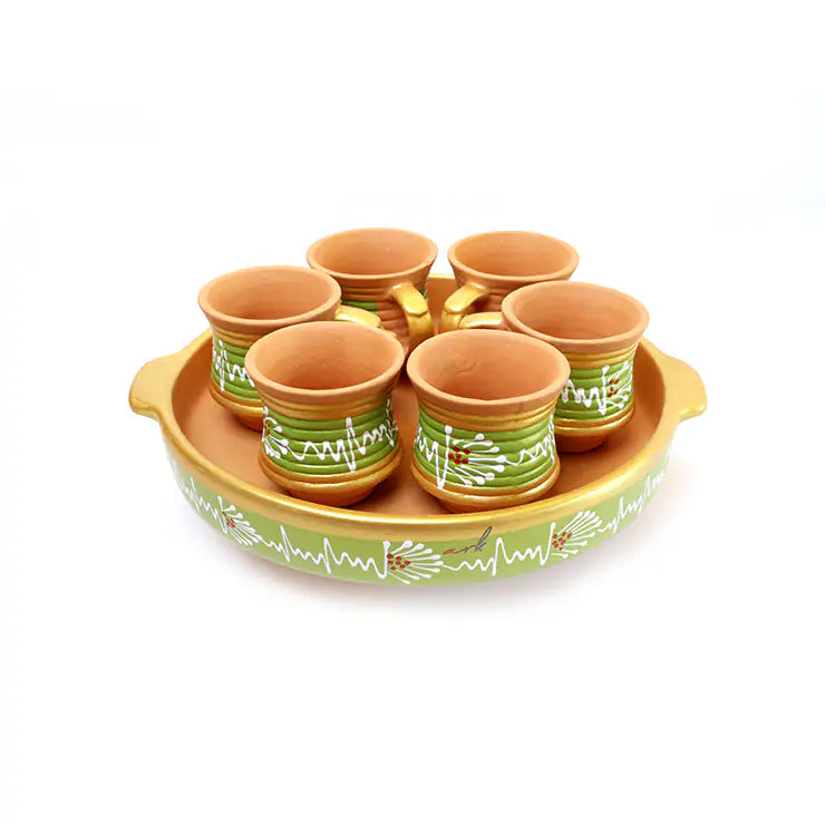 Set of Handpainted Clay  cups with a green and white pattern on a matching tray.