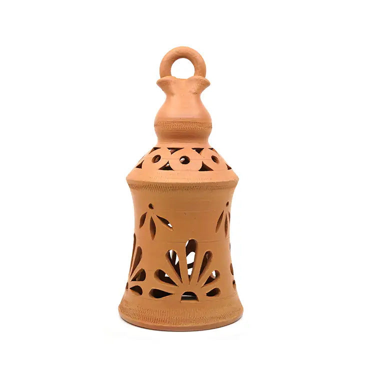 Terracotta lantern with decorative top on a white background
