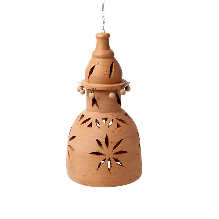 Terracotta hanging lantern with decorative cutouts on a white background