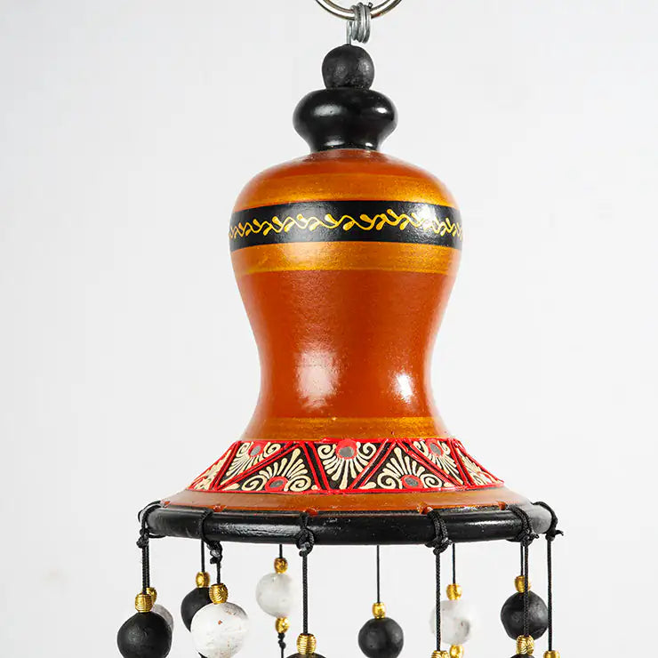 Decorative wind chime terracotta hanging beads on a white background
