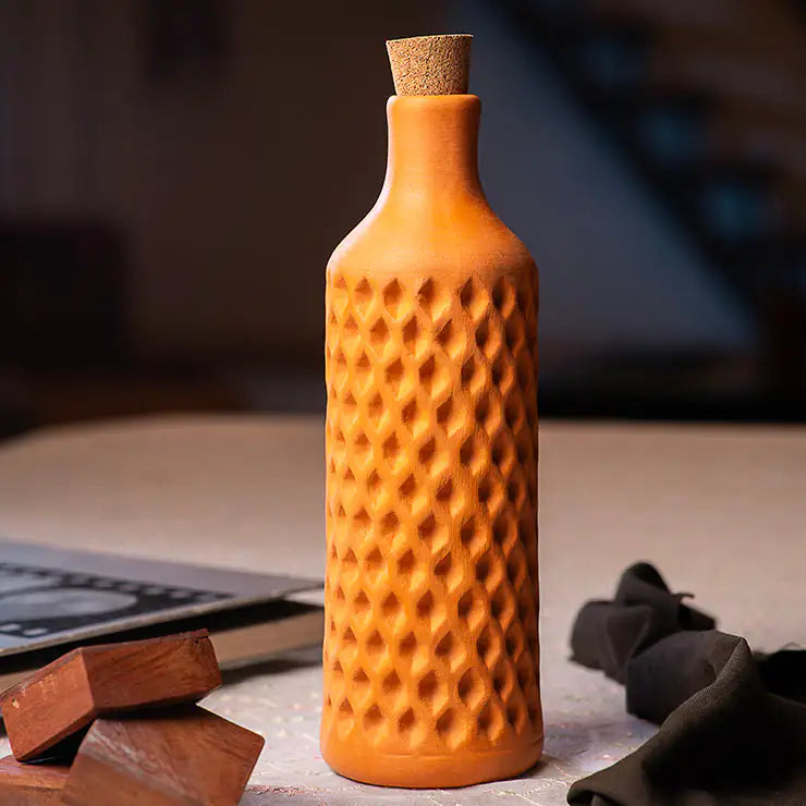 Handmade terracotta water bottle with diamond texture and cork stopper, natural matte finish, 1L