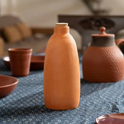 Maison Terracotta 850 ml terracotta water bottle with cork in dining table setting