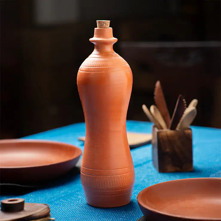 ClayNest Hearth Curve handmade terracotta water bottle with cork stopper, 1 liter, natural finish
