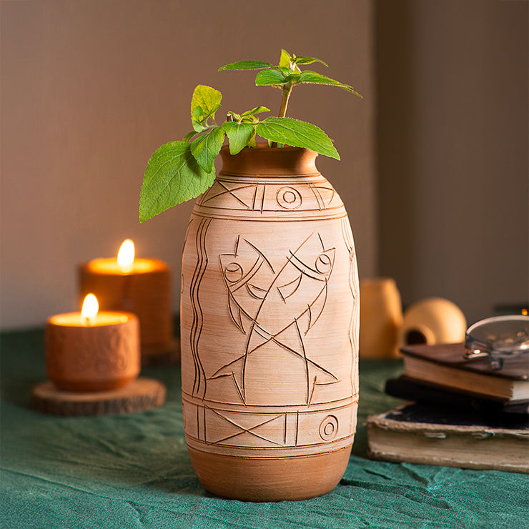 Handmade ClayNest terracotta vase with tribal guardian motif, 21.5 cm