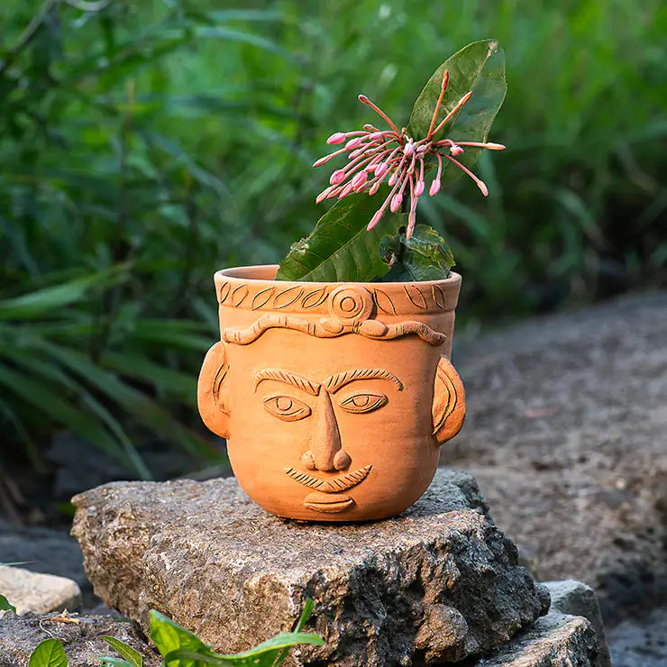 Handmade ClayNest terracotta regal face planter 12.5cm x 14cm
