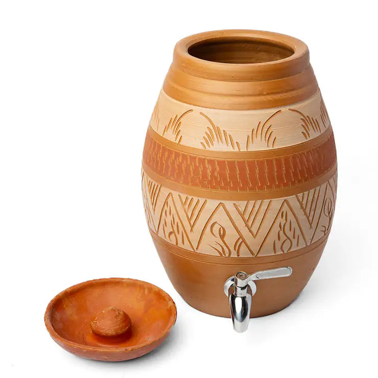 Ceramic water dispenser with decorative patterns on a white background