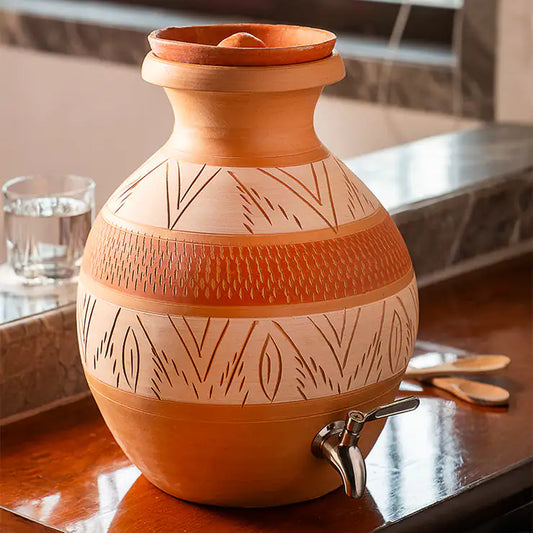 Handmade terracotta matka with tap from ClayNest collection on table setting