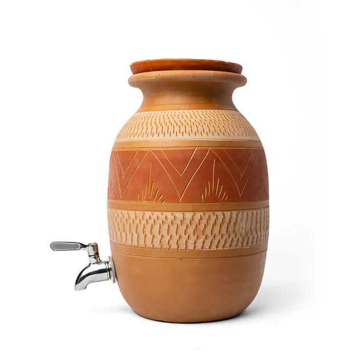 Ceramic drink dispenser with geometric patterns on a white background