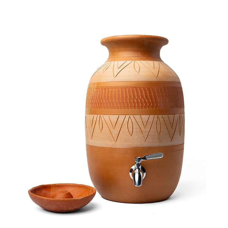Ceramic water dispenser with decorative patterns on a white background