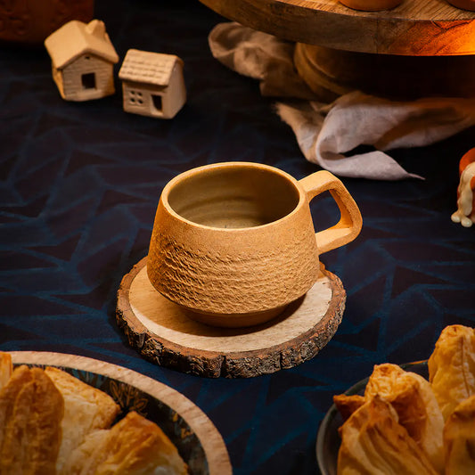 Handmade clay espresso cup with earth brown interior