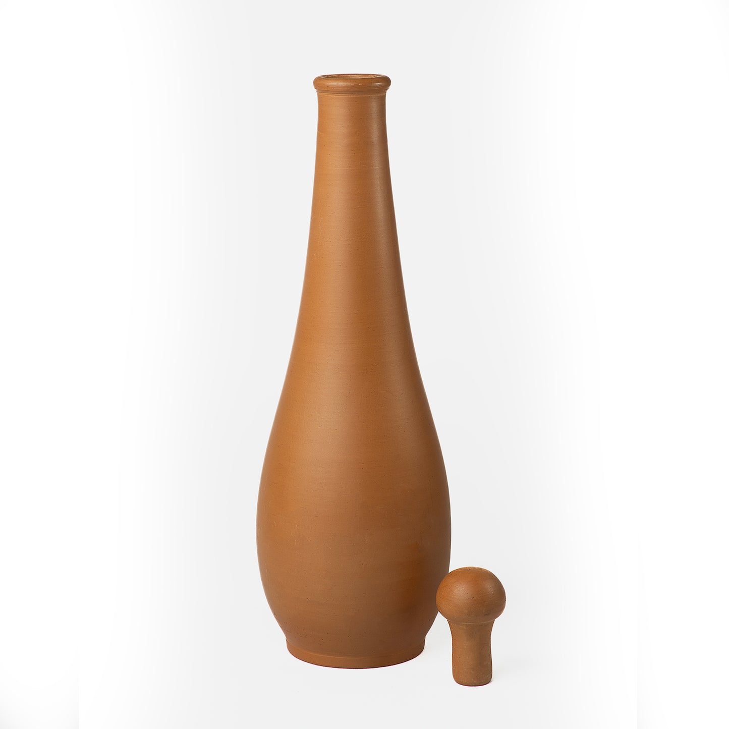 Tall natural terracotta water bottle with handmade clay stopper from Crimson Noir collection