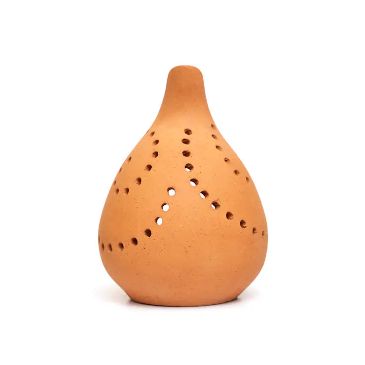 Back view of handmade terracotta droplet candle holder with perforations