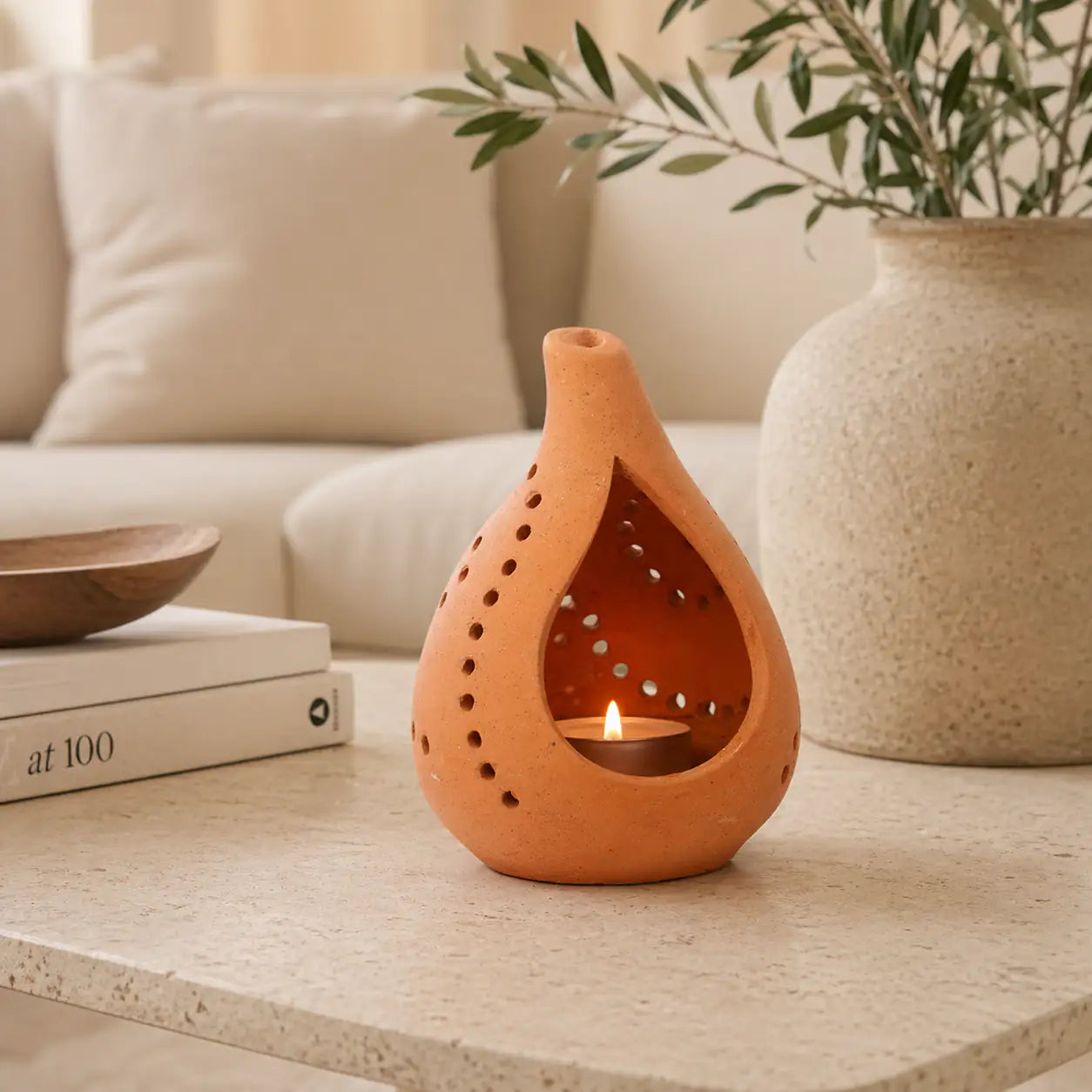 Amour Eclat droplet glow terracotta candle holder for home décor