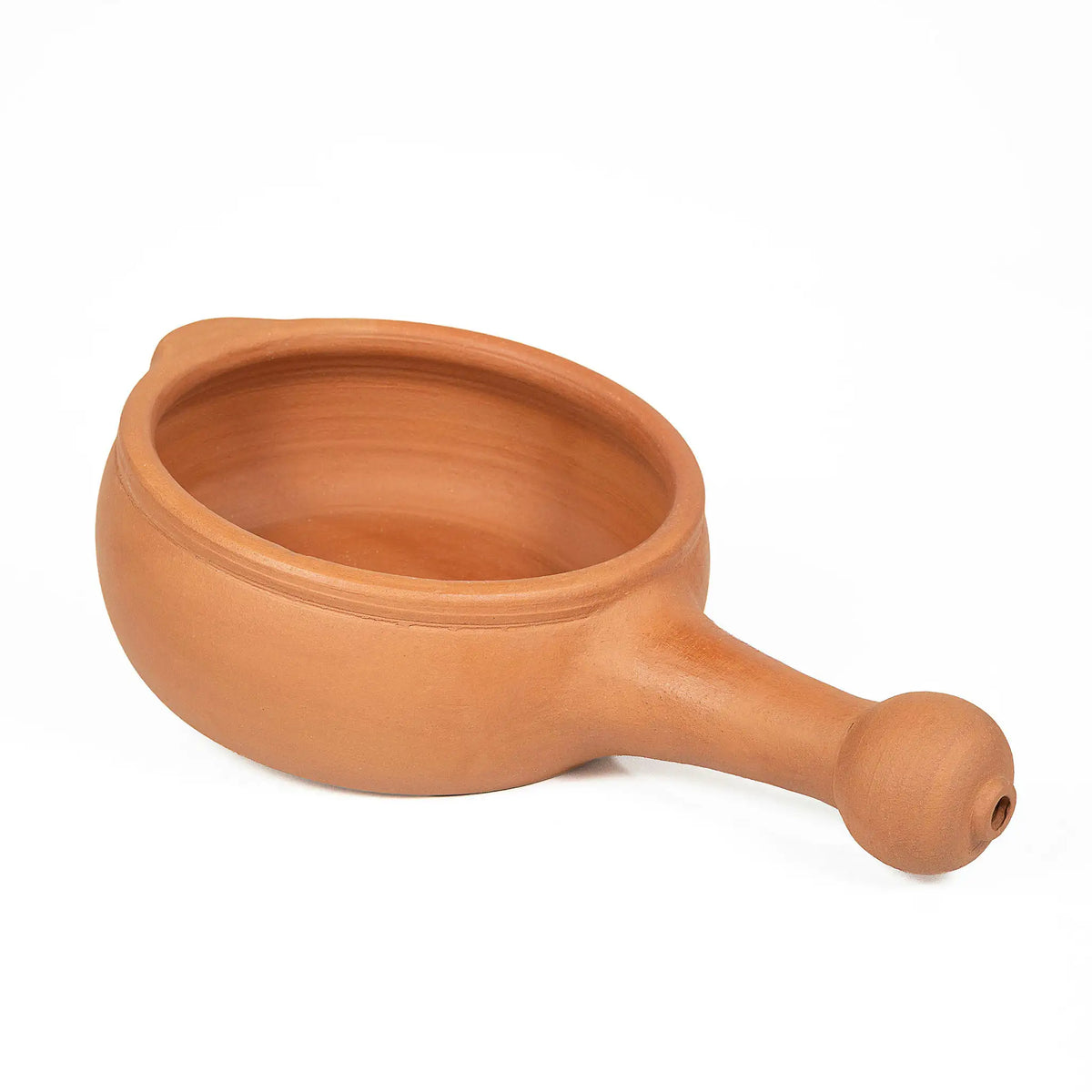 Natural unglazed terracotta cooking pan with integrated clay handle