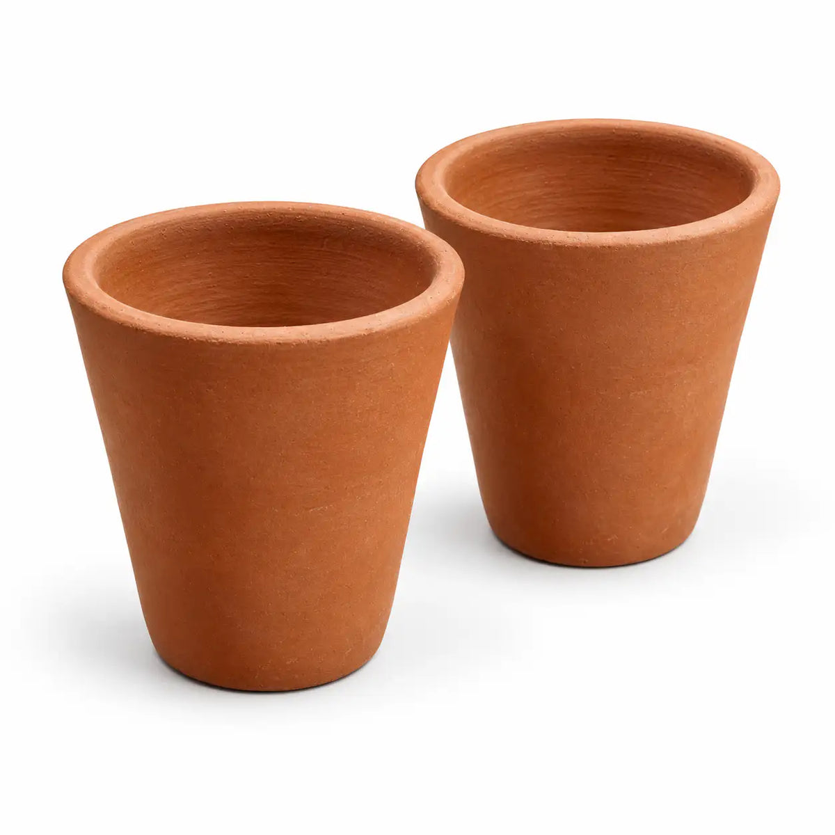 Handmade unglazed terracotta water glasses set of 2 angled view