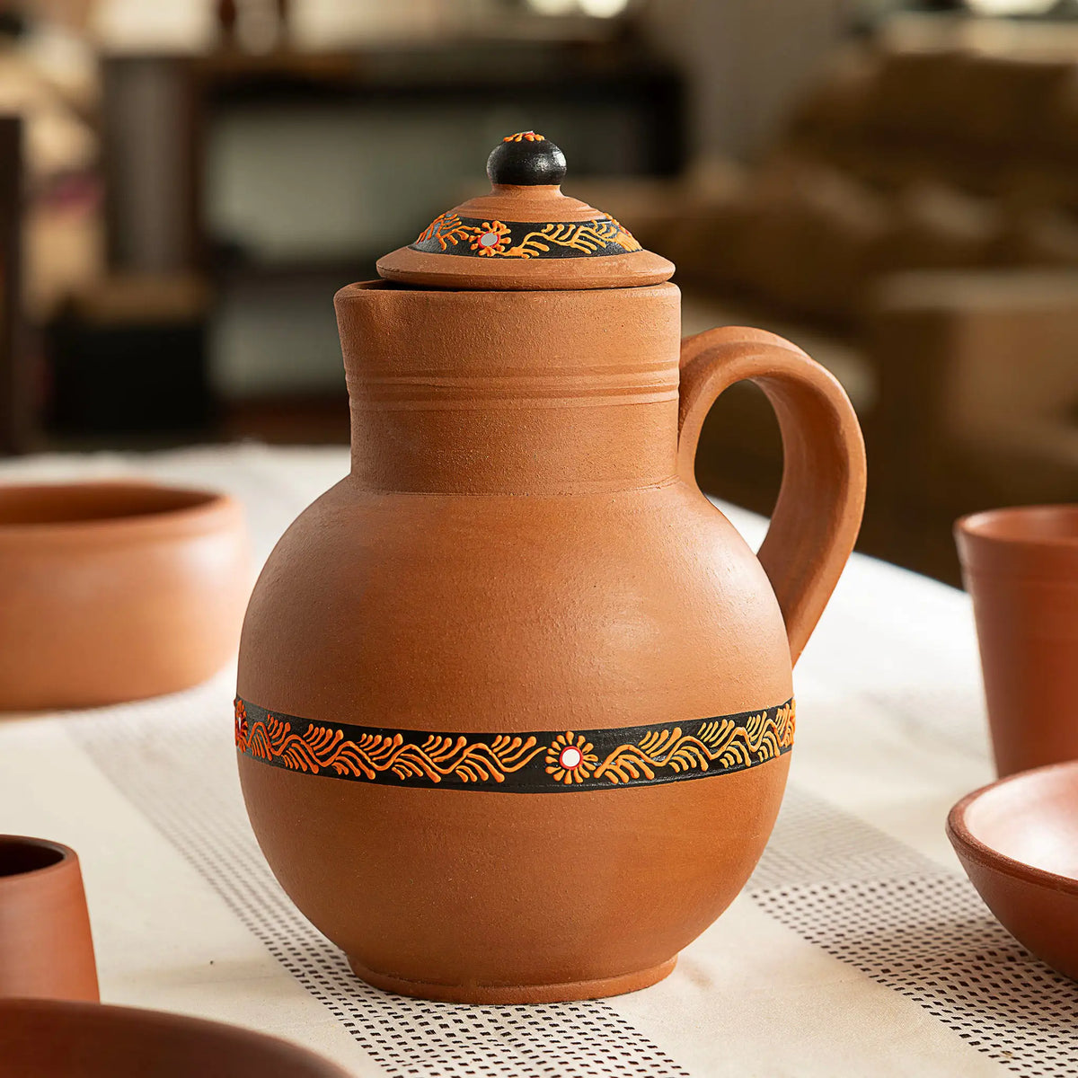 Terra Aseel artisan-painted clay water jug lifestyle setting