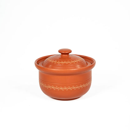 Open terracotta serving bowl with matching lid from Terra Majlis collection