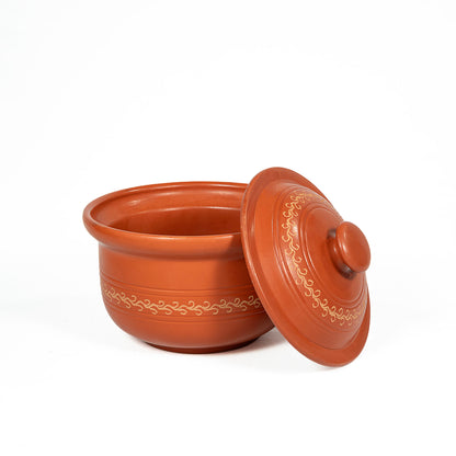 Open handmade terracotta serving bowl with matching lid