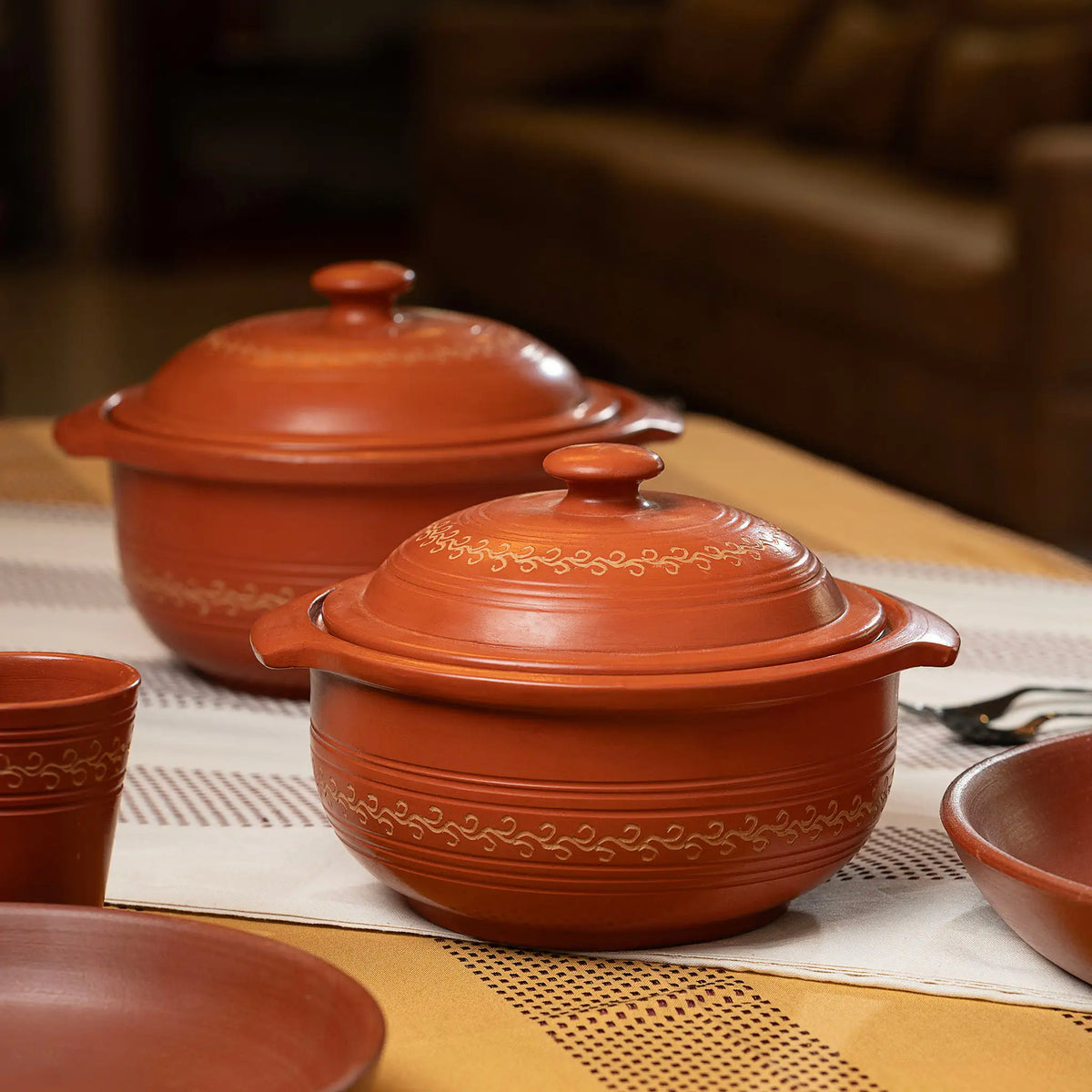 Terra Majlis terracotta serving pots with lids styled for dining table