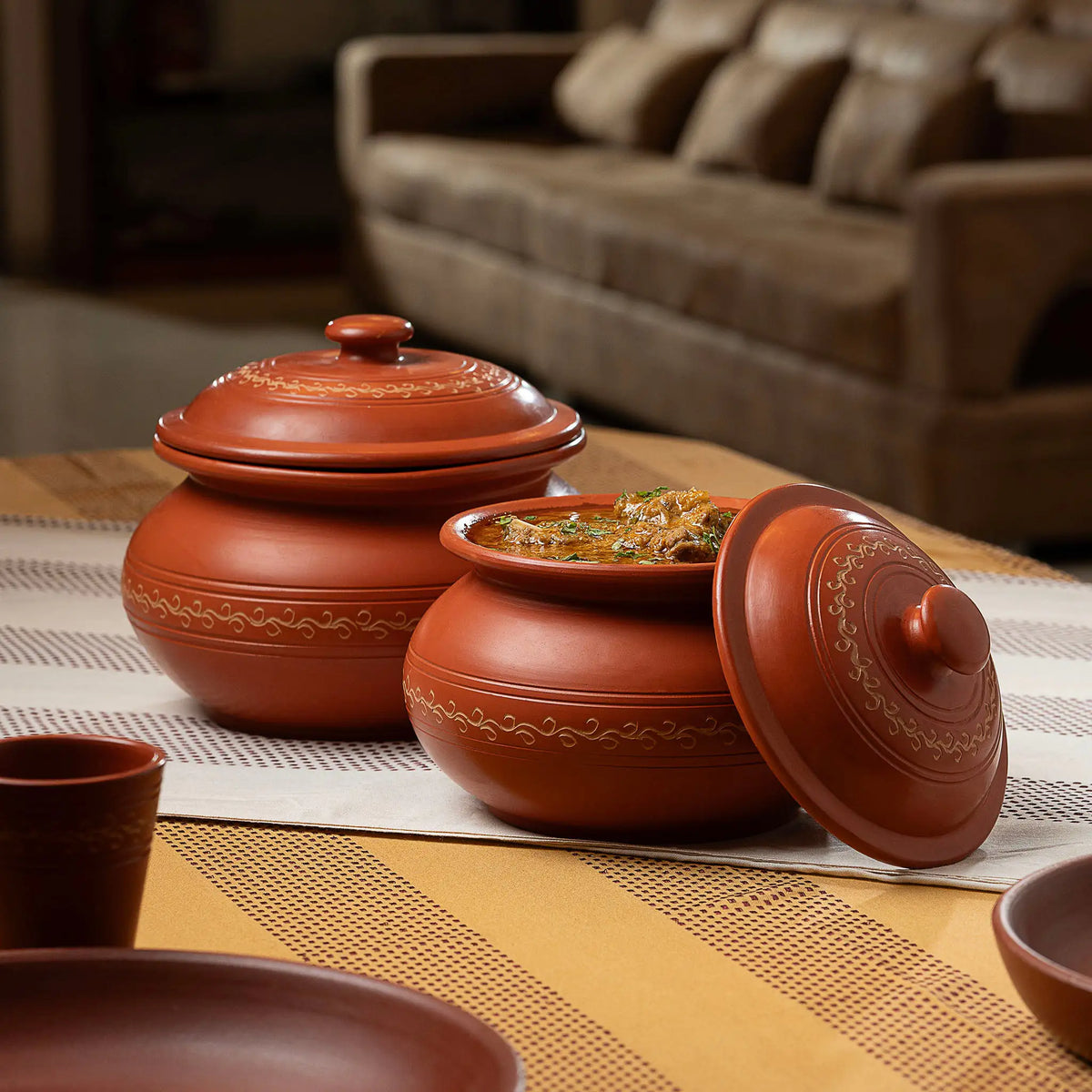 Terra Majlis round terracotta serving pots with lids for family-style dining