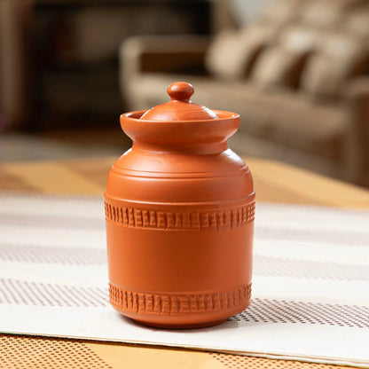 Medium terracotta countertop storage jar in lifestyle setting