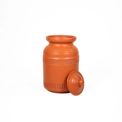 Large terracotta storage jar with lid removed