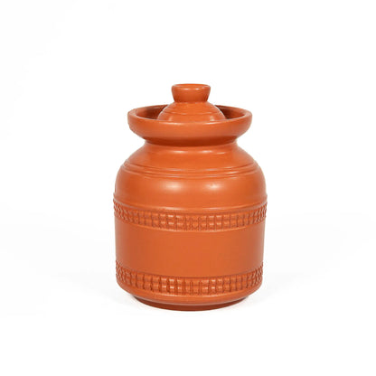 Small handmade terracotta jar with lid