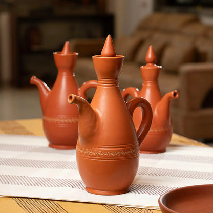 Terra Majlis terracotta serving jugs styled for dining and majlis hosting