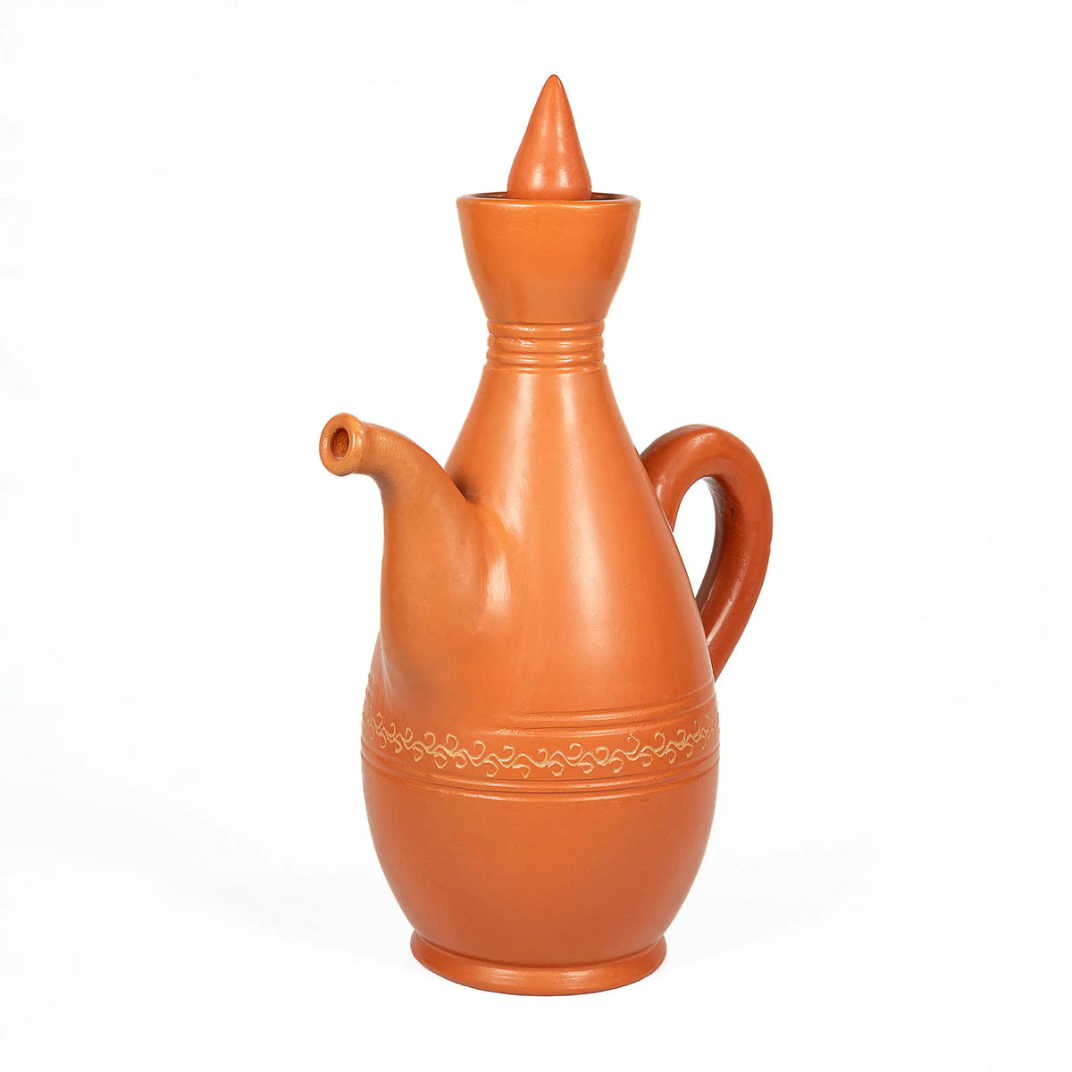 Handmade terracotta serving jug with curved handle spout and pointed lid
