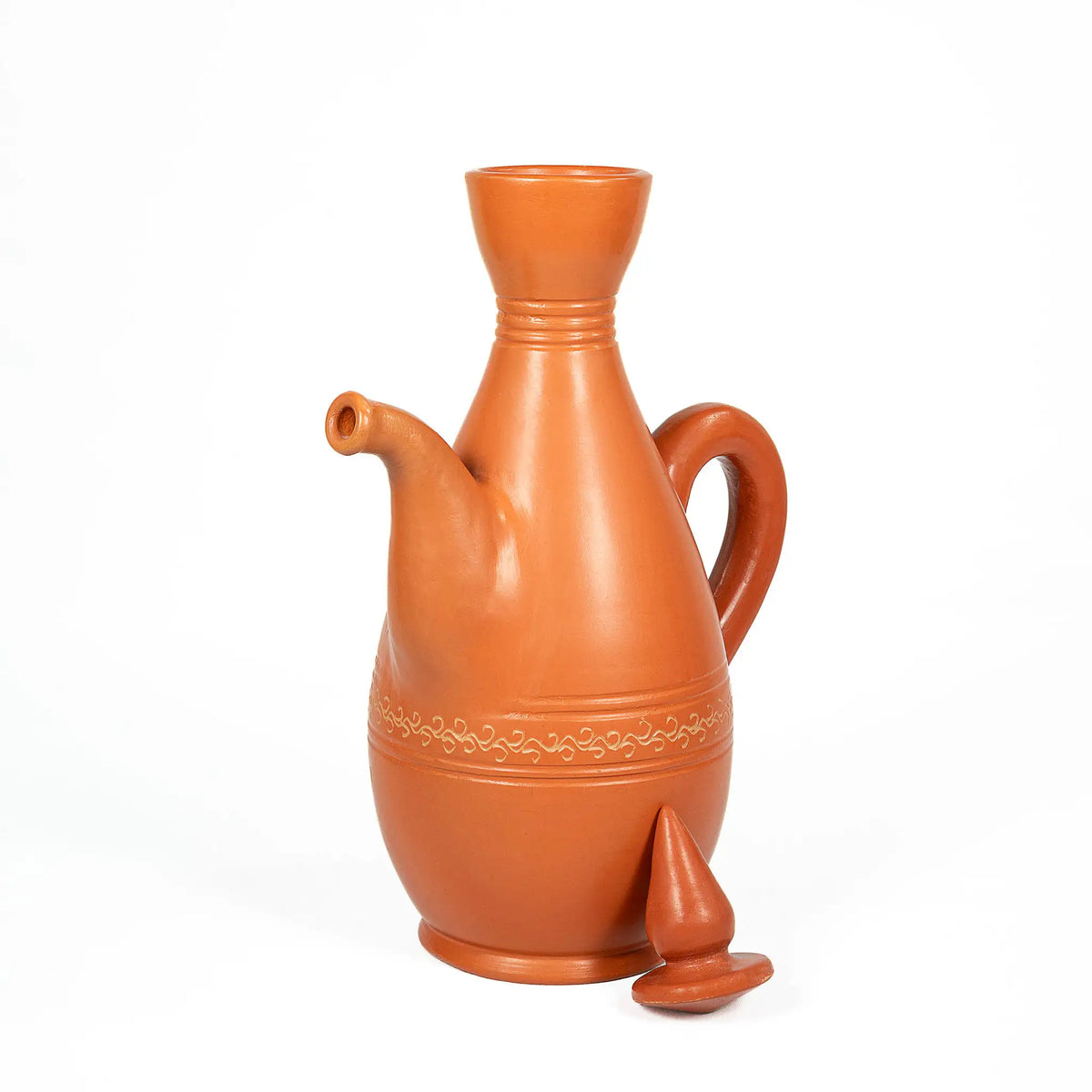 Terracotta serving jug with removable clay lid
