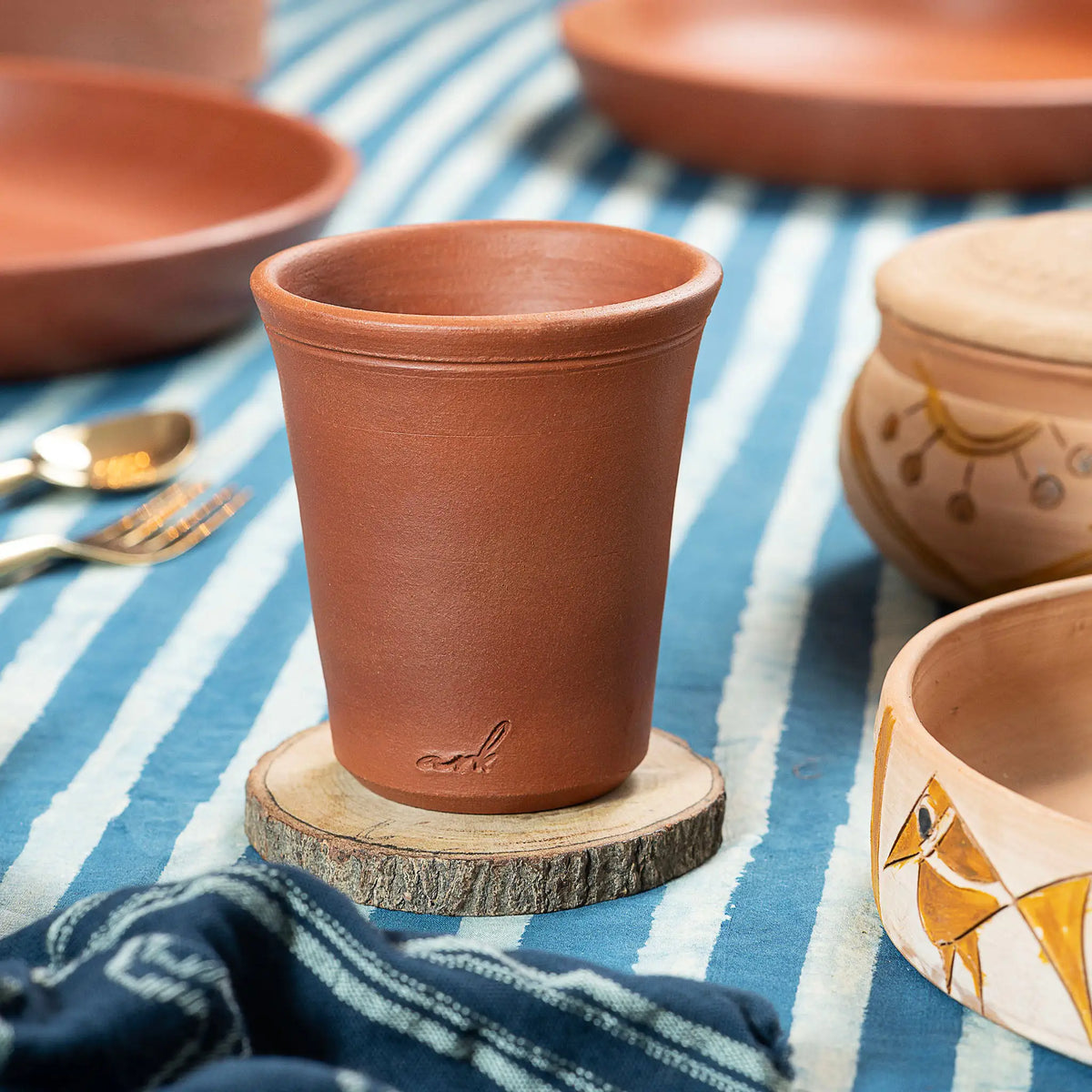 ClayRootz handmade clay glass 200 ml in lifestyle table setting