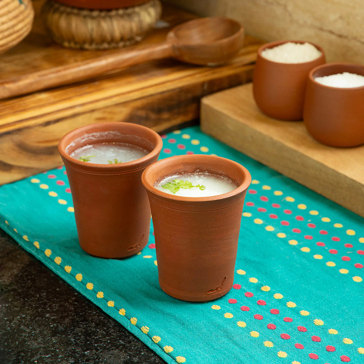ClayRootz handmade terracotta glass 200 ml served with traditional drink