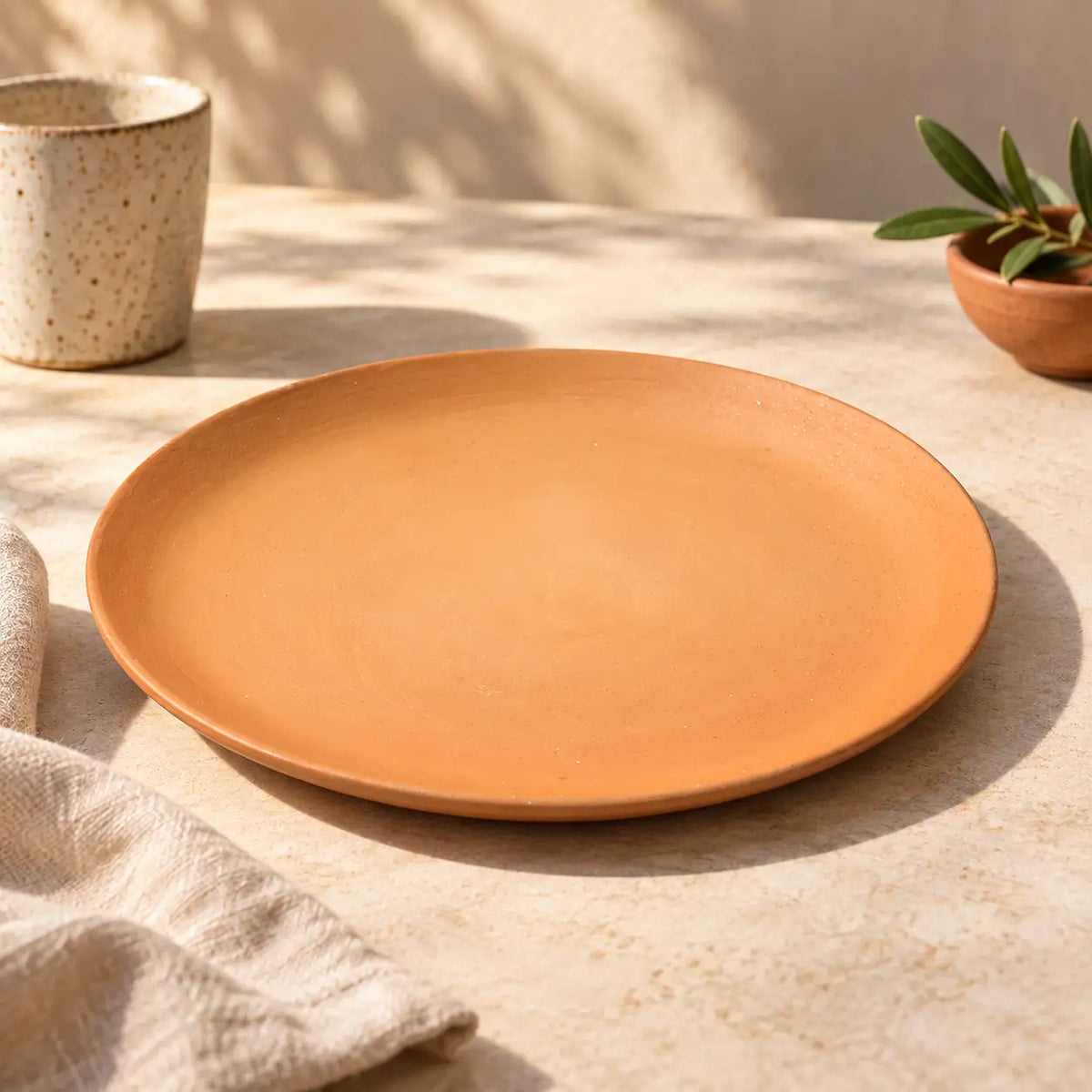 Terrapura natural terracotta plate empty lifestyle view