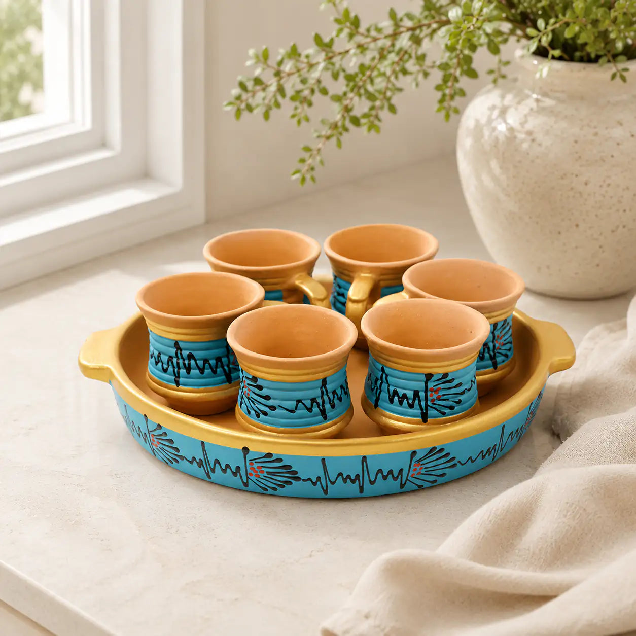 Terrapura handmade terracotta tea cup set with six handpainted cups and matching serving tray