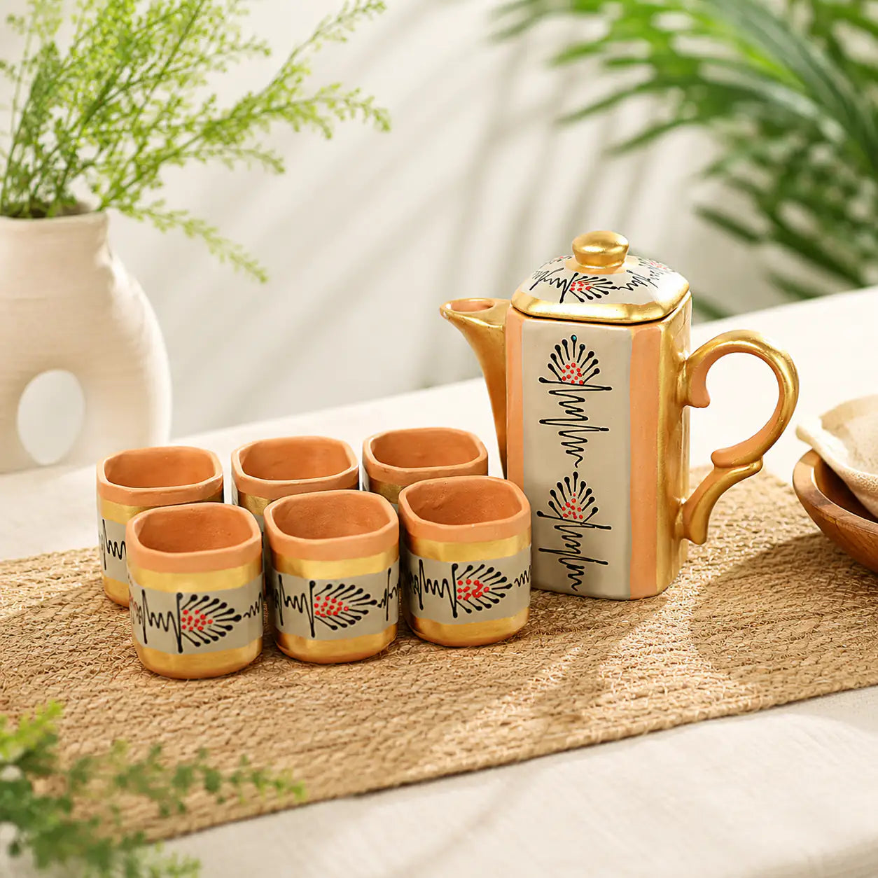 Terrapura beige handpainted terracotta tea pot set with six cups by ARK Naturals