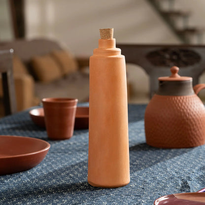Terrapura 500 ml terracotta water bottle with cork in lifestyle setting