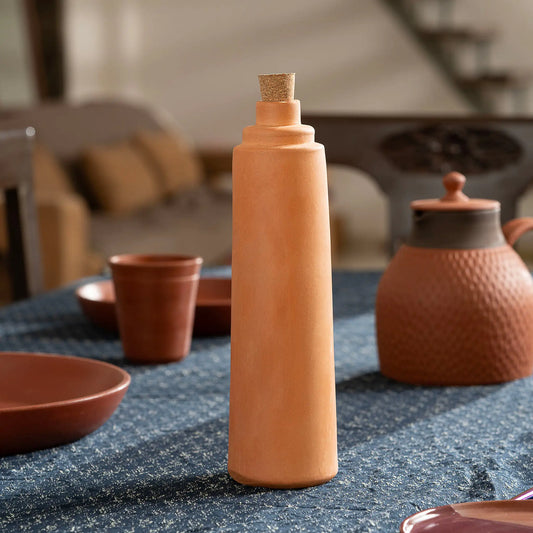Terrapura 500 ml terracotta water bottle with cork in lifestyle setting