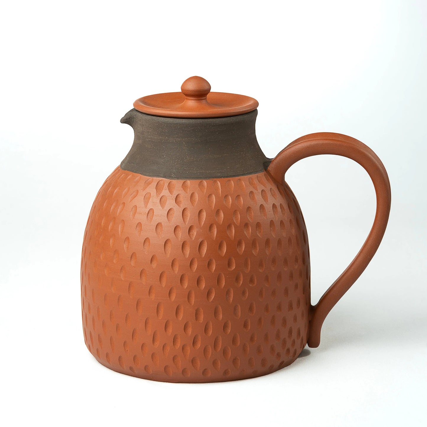Layali Dune textured terracotta serving jug with lid front view