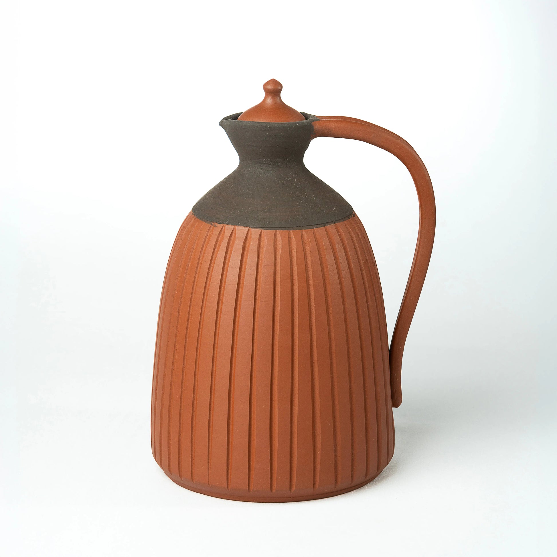 Premium handmade terracotta jug with vertical ribbed design
